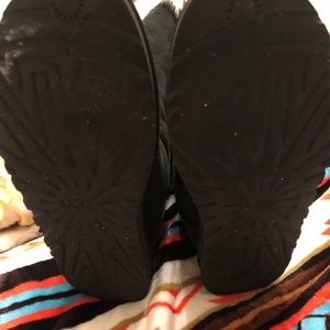 Three pair of UGG boots.  Size 8